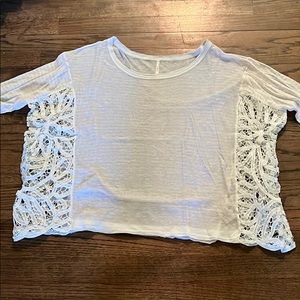 Lace inset pale pink stripe flyaway top.